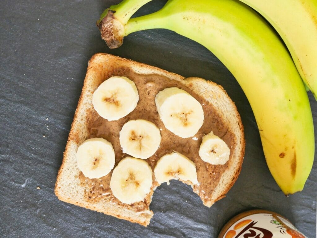 almond butter and banana toast with ripe bananas