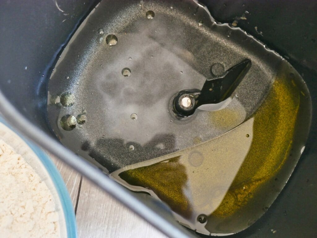 oil and water in bread pan