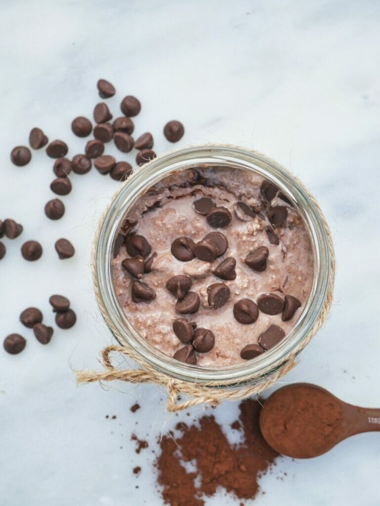 cocoa overnight oats in bowl with spoon