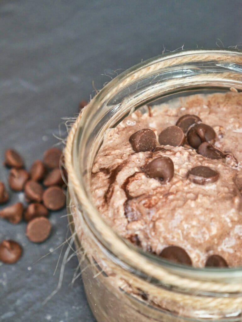 cocoa overnight oats with chocolate chips in mason jar