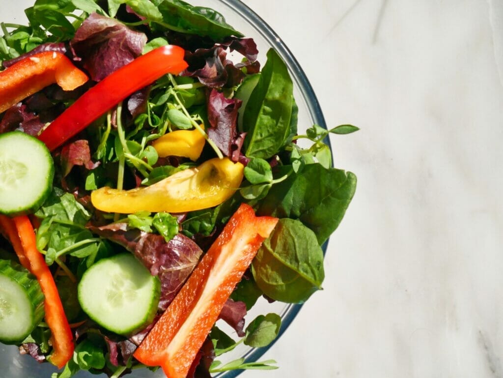 cucumber and bell pepper salad in bowl