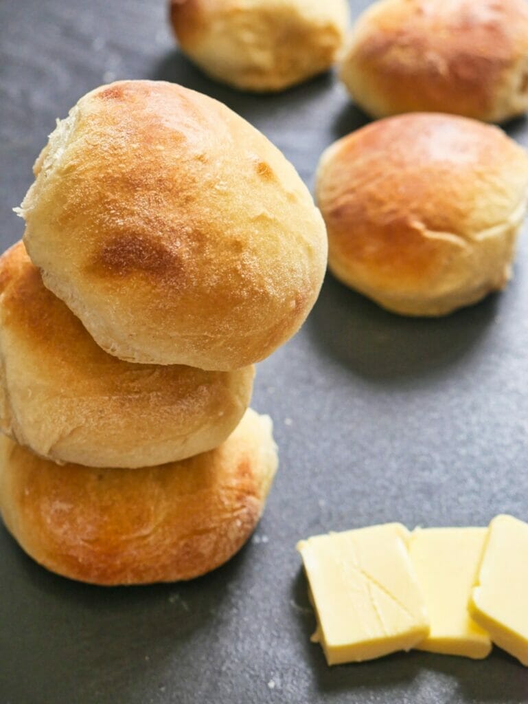 tower of three brioche buns with butter