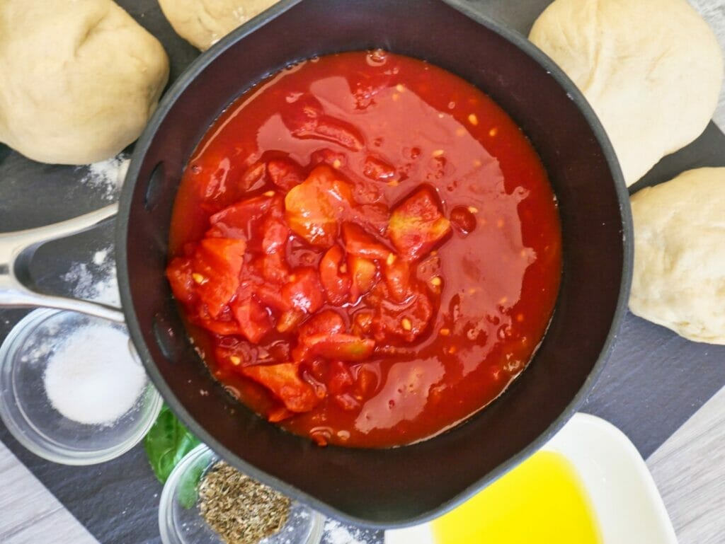 choppted tomatoes in pot from above