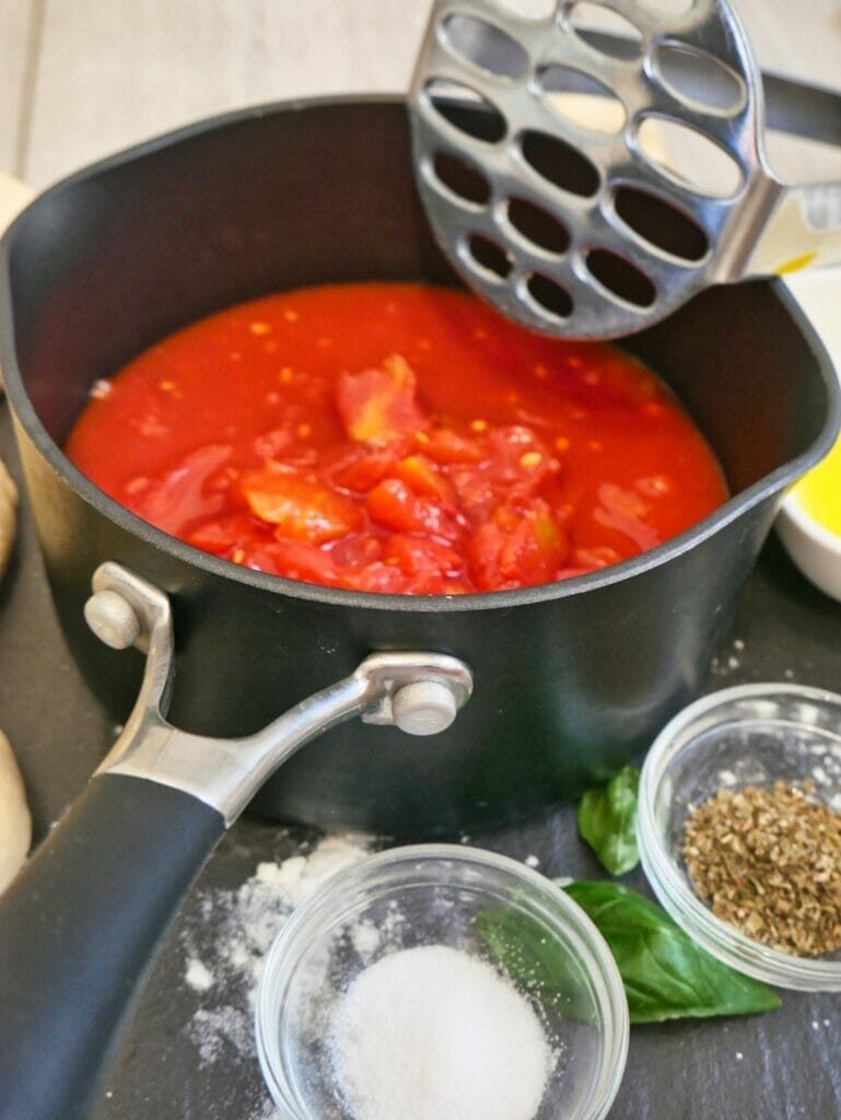 chopped tomatoes in pot