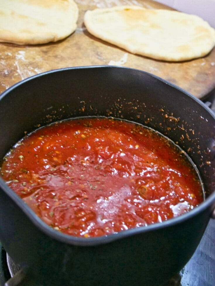 pizza sauce on stove