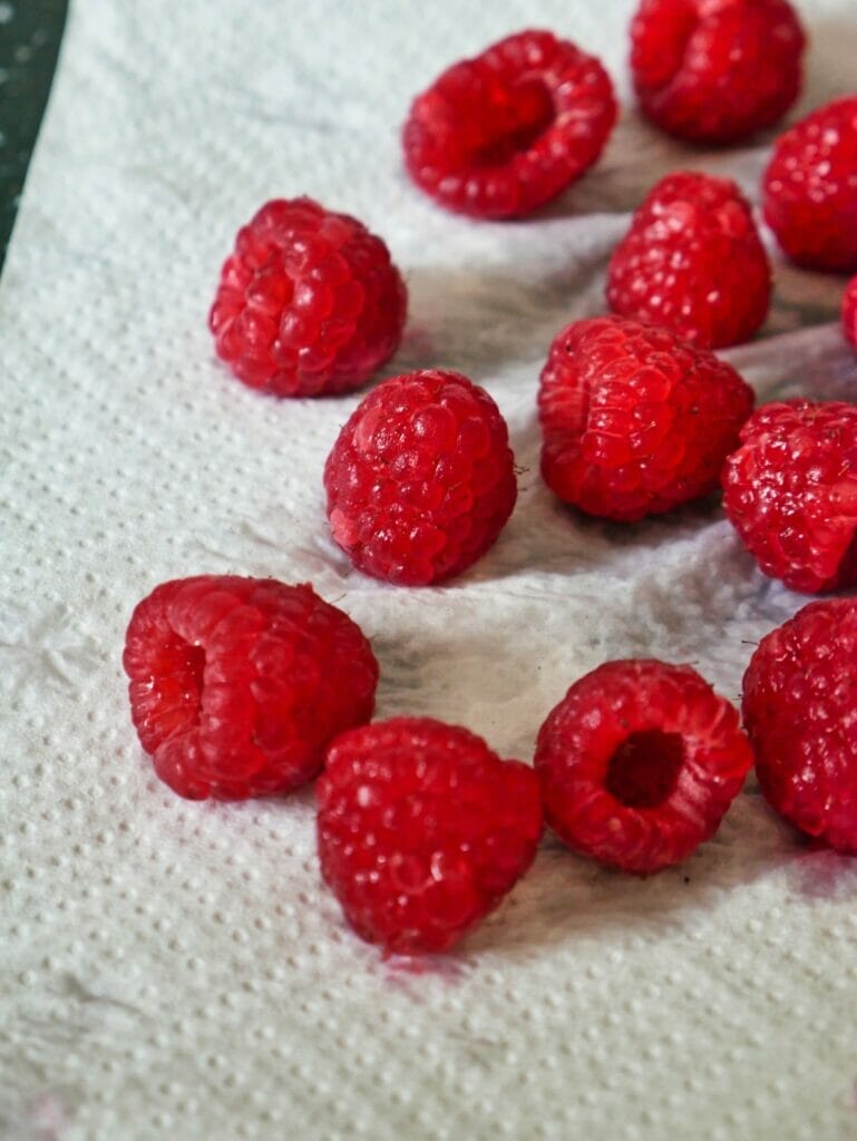 raspberries on paper towel