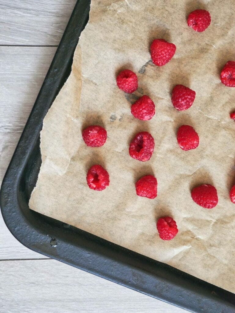 raspberries on parchment paper