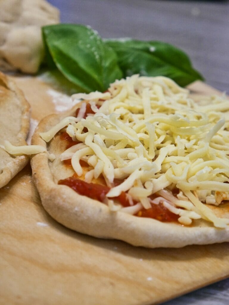 individual pizza with unmelted mozzarella