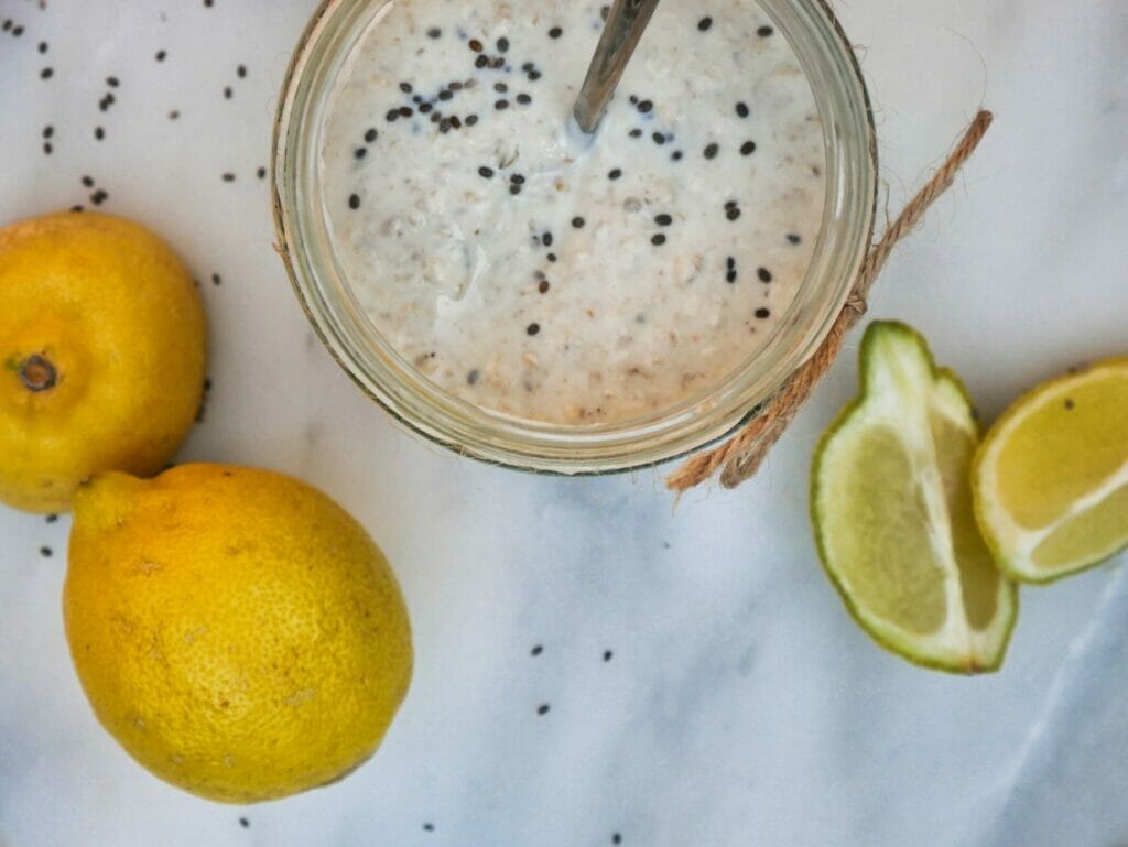 lemon overnight oats with spoon and chia seeds