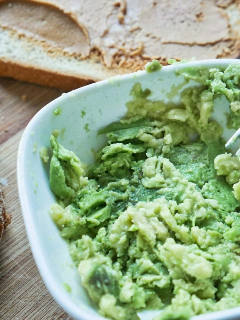 smashed avocado in bowl