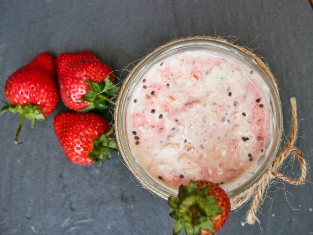 strawberry overnight oats and fresh strawberries