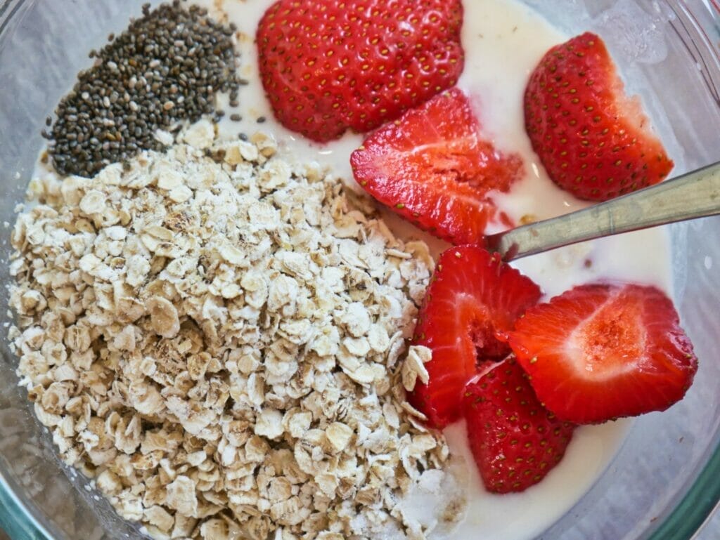 bowl of strawberries oatmeal and chia seeds