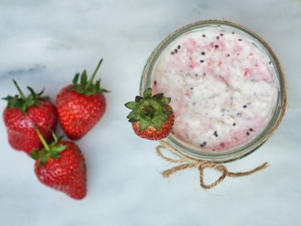 strawberry overnight oats and fresh strawberries