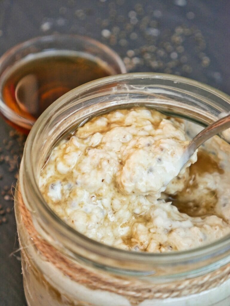 vanilla overnight oats with vanilla in background