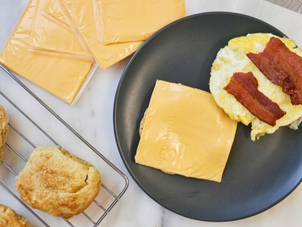 bacon egg and cheese biscuit on a plate