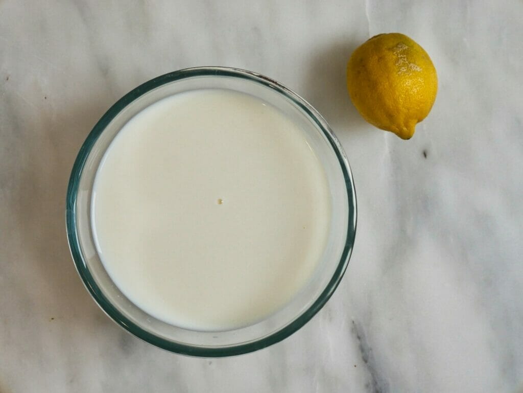 milk in bowl and lemon