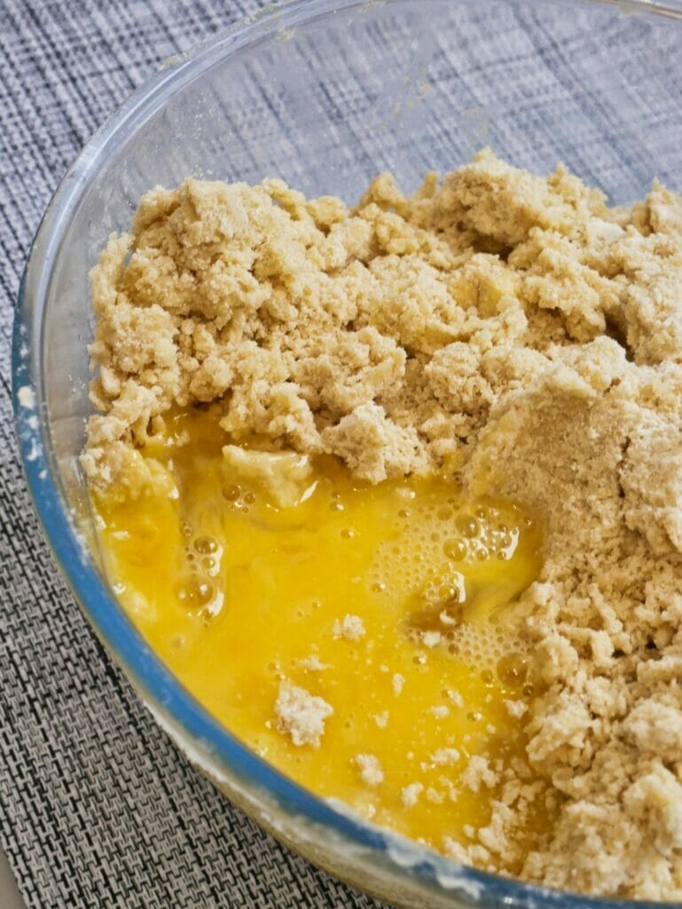 egg and biscuit dough in bowl