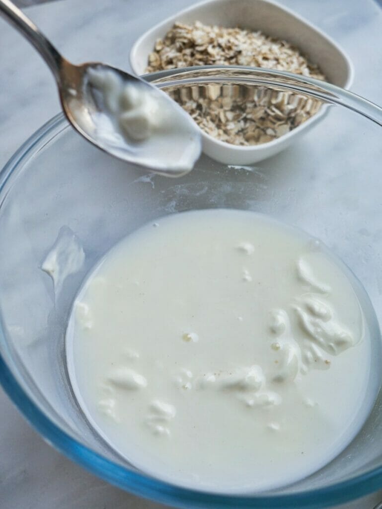 yogurt and water mixed together in a bowl