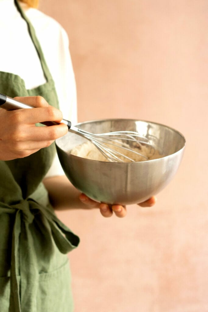 Chef using a whisk