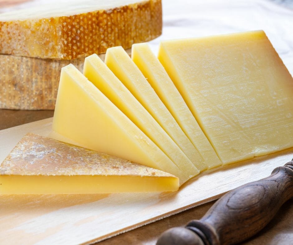 Gruyere cheese on a cutting board