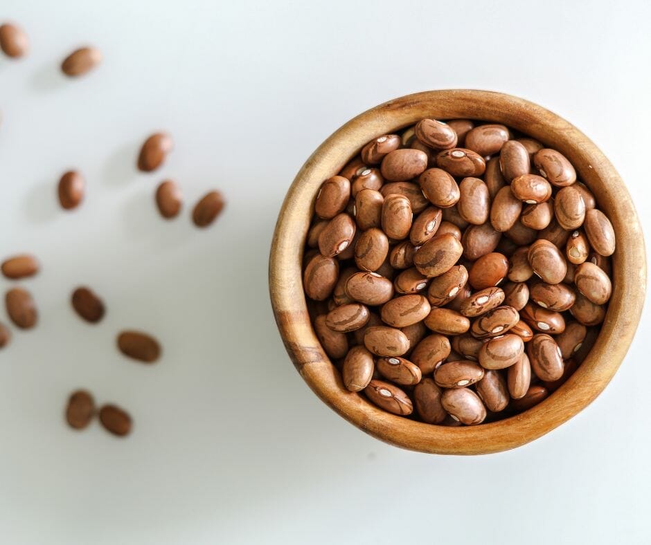 Pinto beans in a wooden bowl 