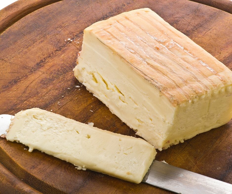 Taleggio cheese on a cutting board 