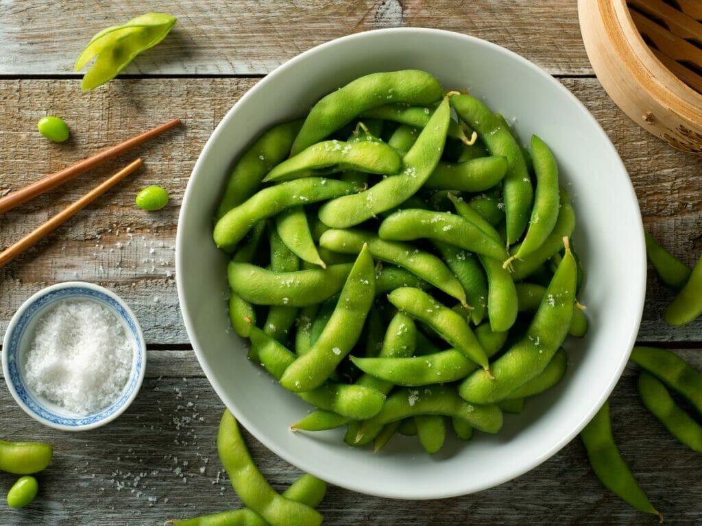 Edamame in a white dish 