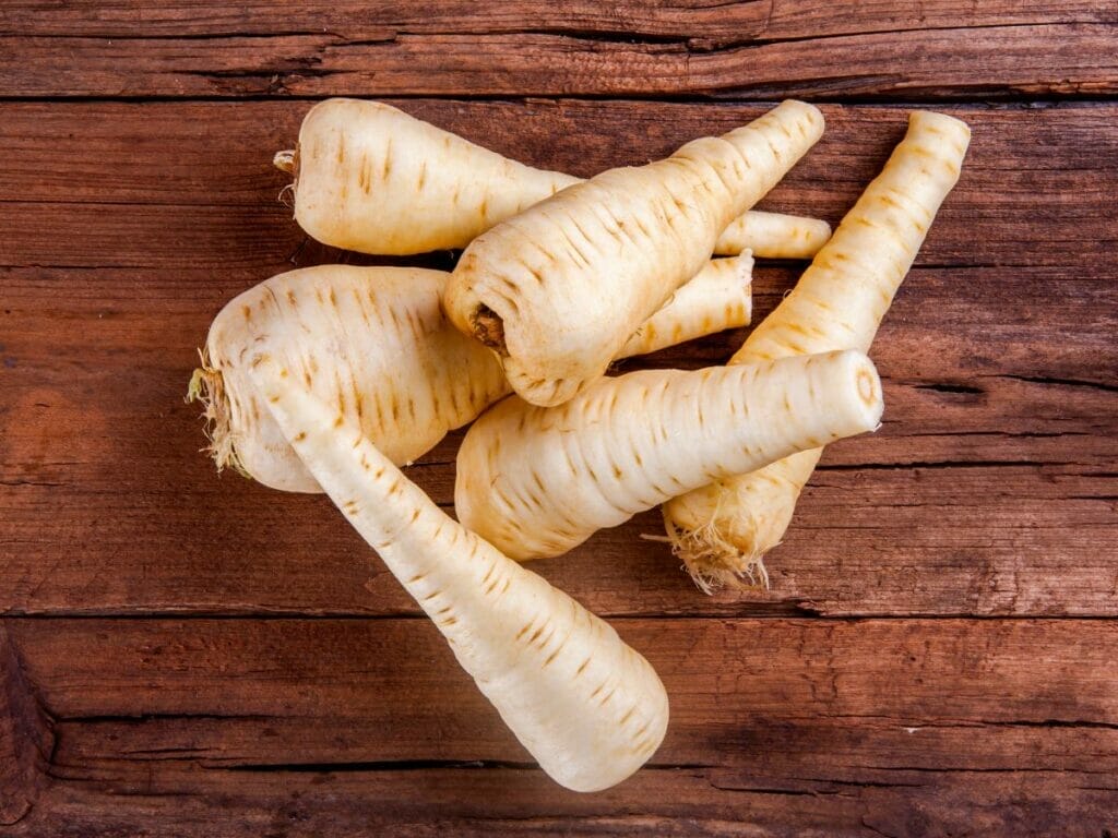 Parsnips on a wooden table
