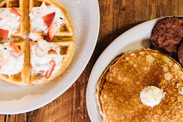 Waffles and pancakes plated together 